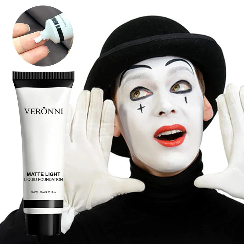 White liquid foundation tube and a person in professional mime makeup.