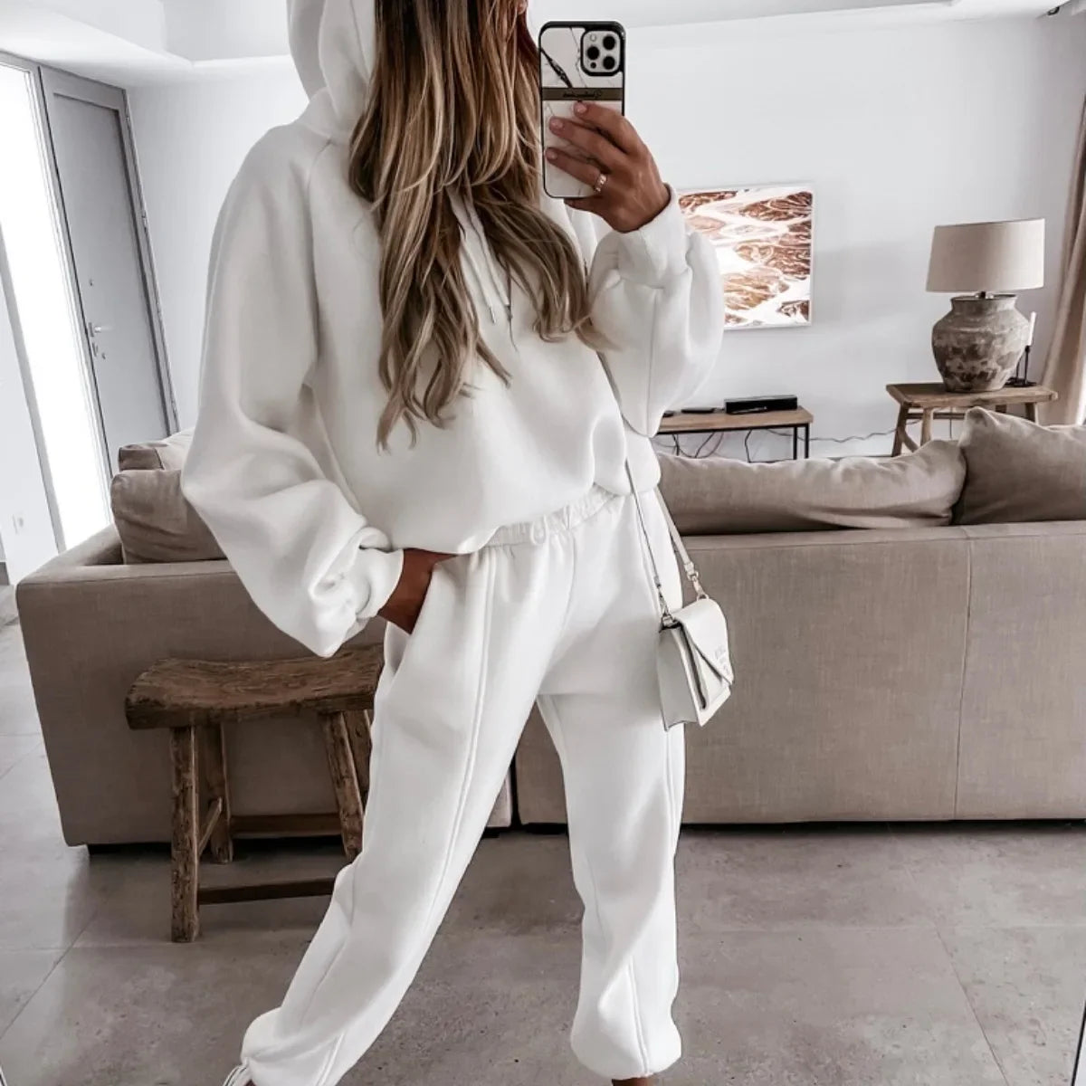 White long sleeve hooded sweatshirt and matching jogger sweatpants set