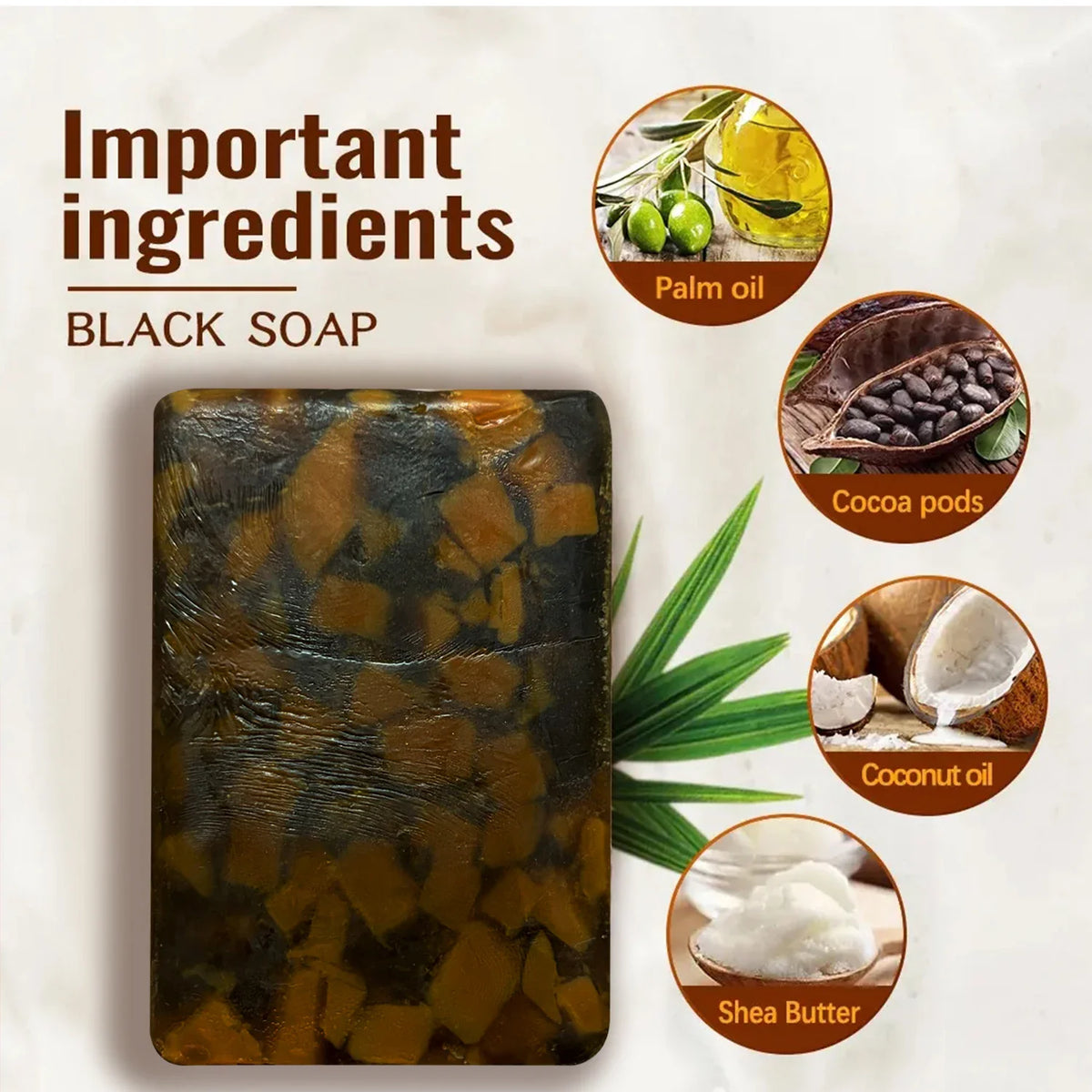 African black soap bar with circular insets showing ingredients like palm oil, cocoa pods, coconut oil and shea butter