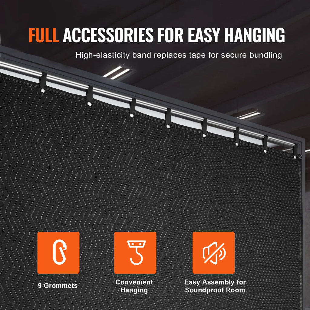 Black sound-dampening blanket hanging on a rod with grommets for easy acoustic installation