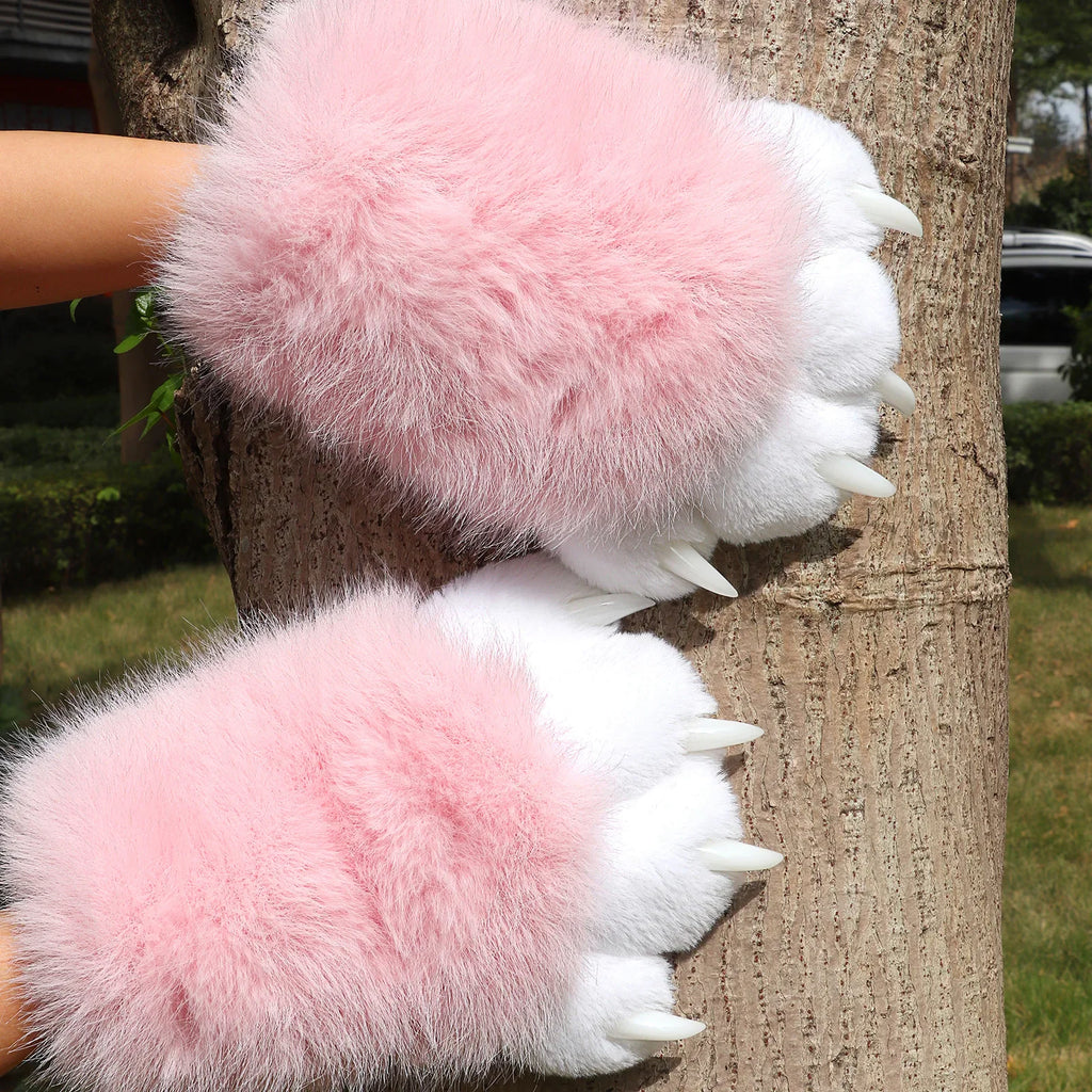 Pair of pink and white plush furry animal paw gloves with claws