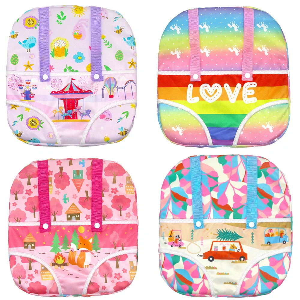 Selection of four patterned doll carrier backpacks featuring woodland, unicorn, and carnival designs.