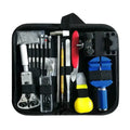 A comprehensive watch repair toolkit set in a black zippered storage case