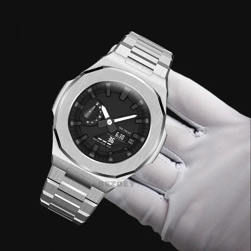 Silver watch modification kit held by a hand in a white glove