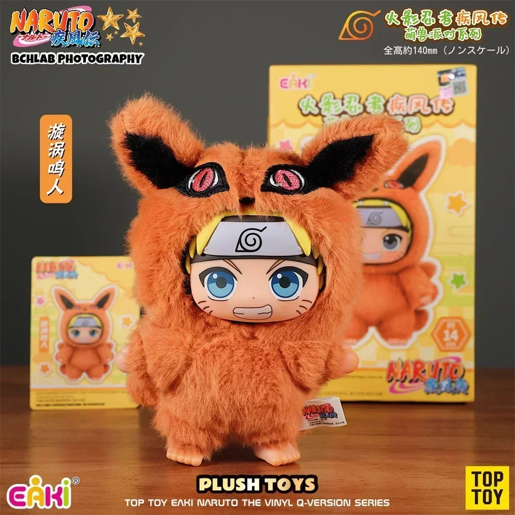 Orange fox anime plush toy with its branded packaging box in the background