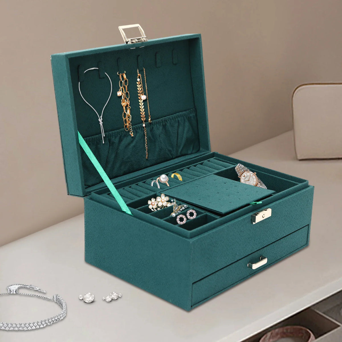 Dark green suede 3-tier jewelry box organizer with an open top lid and a pull-out drawer