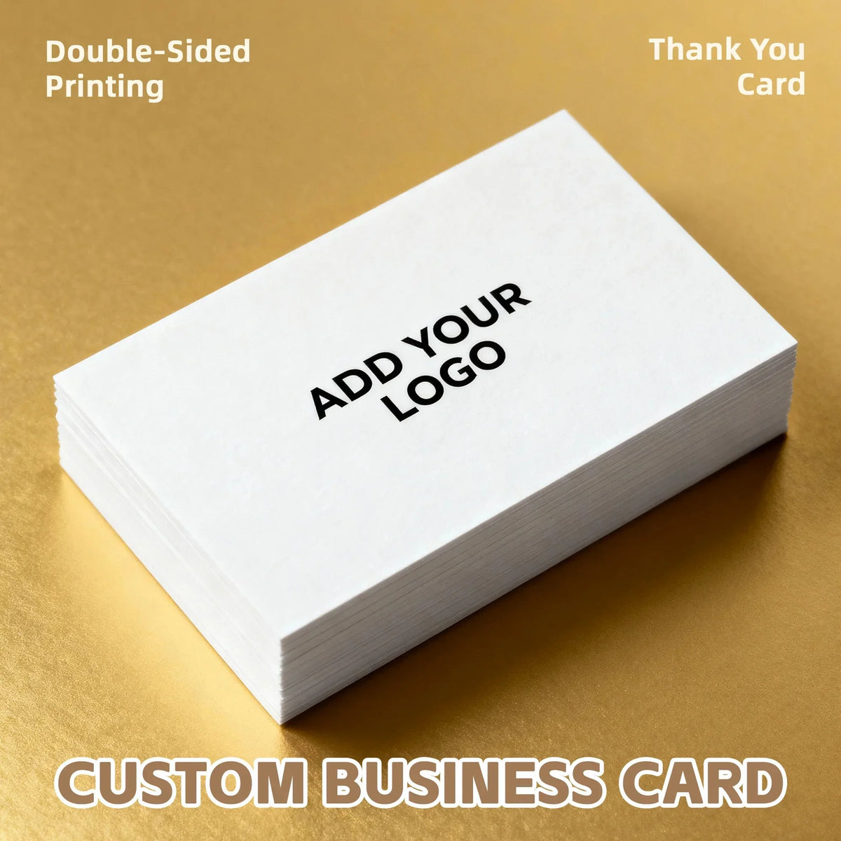 Stack of blank white business cards on a gold surface