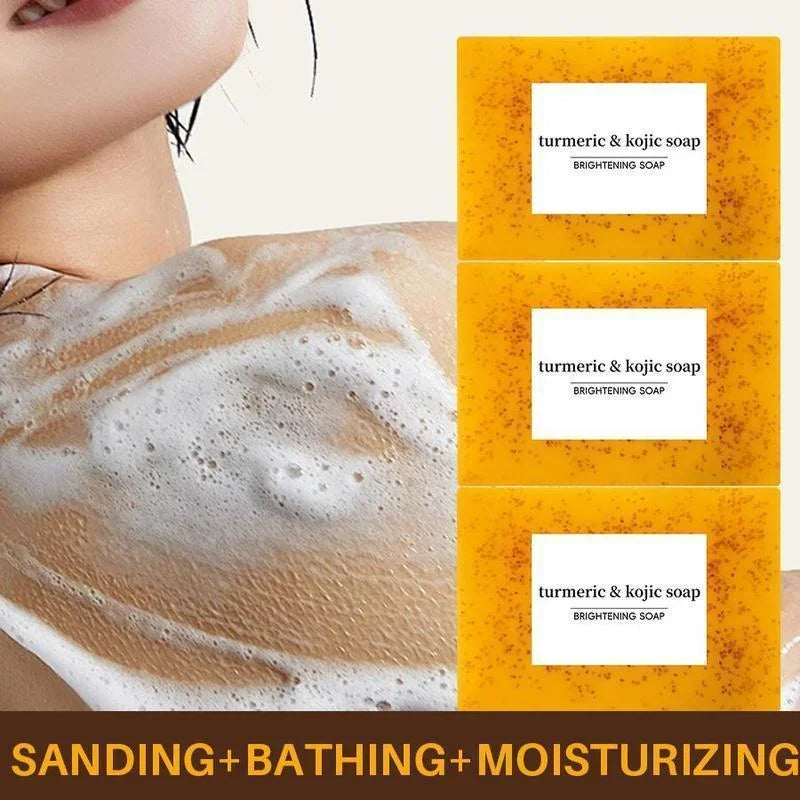 Three bars of turmeric and kojic brightening soap with foam on skin