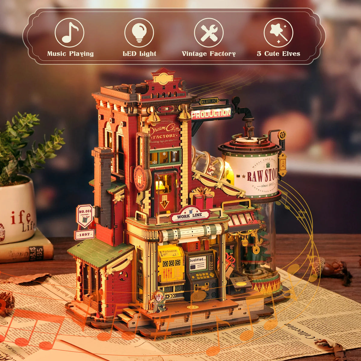 A miniature wooden toy factory 3D puzzle model with informational icons and text overlays.