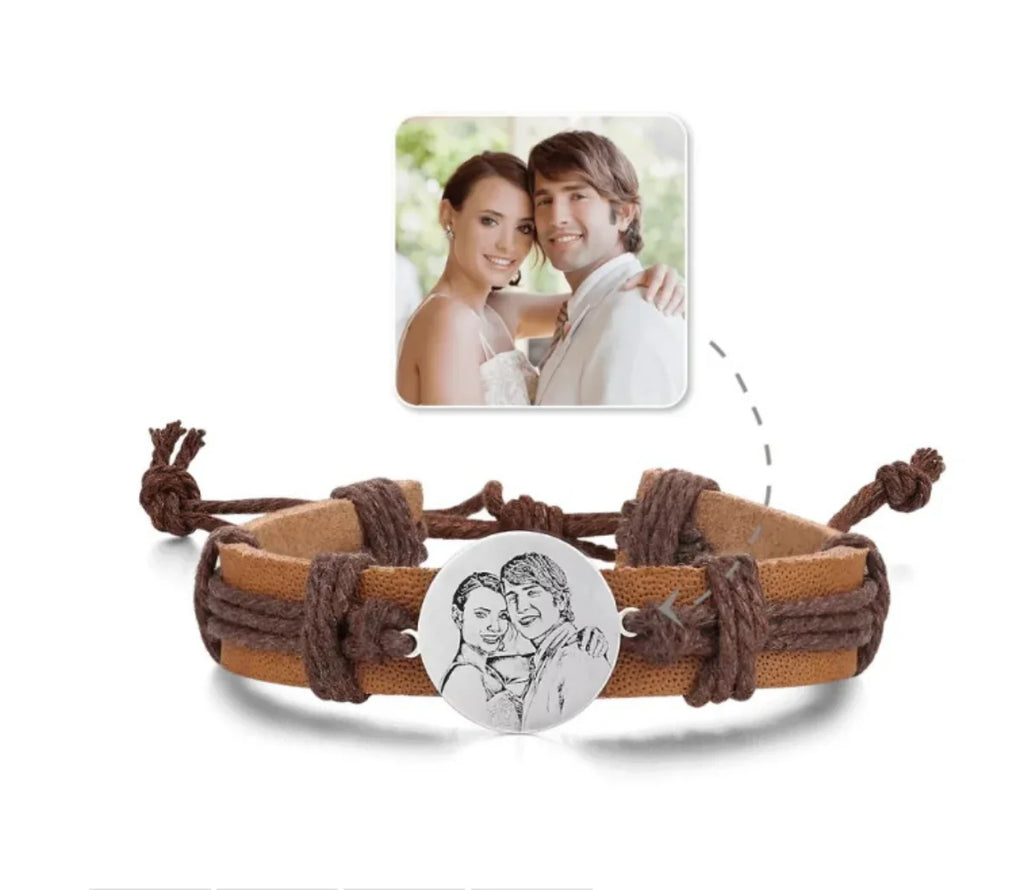 Brown leather bracelet with a custom round stainless steel pendant featuring an engraved couple's portrait.