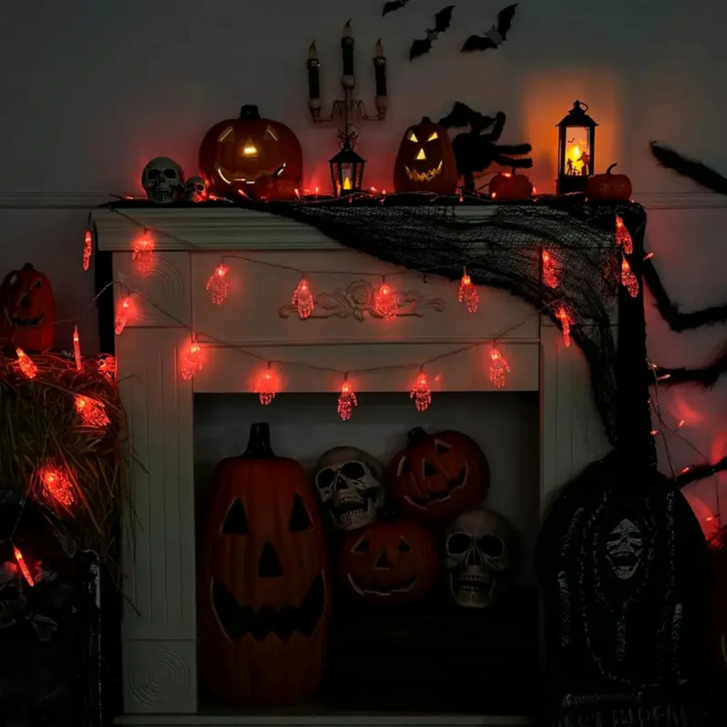 20 LED Halloween skeleton hand string light in multiple colors on a dark background – view 6