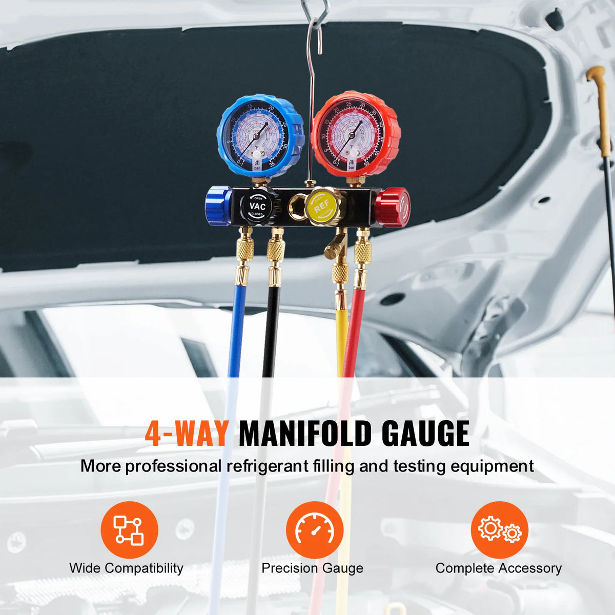 4-way manifold gauge set with color-coded hoses hanging from a vehicle hood