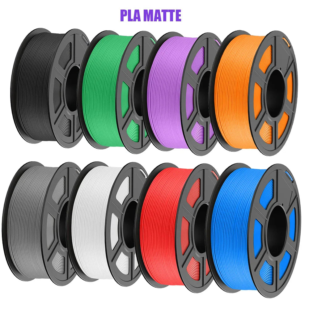 A collection of matte PLA 3D printer filament spools in various solid colours.