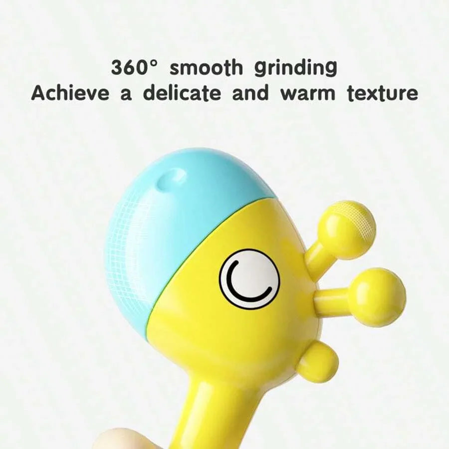 Close-up of a yellow and blue giraffe baby rattle head