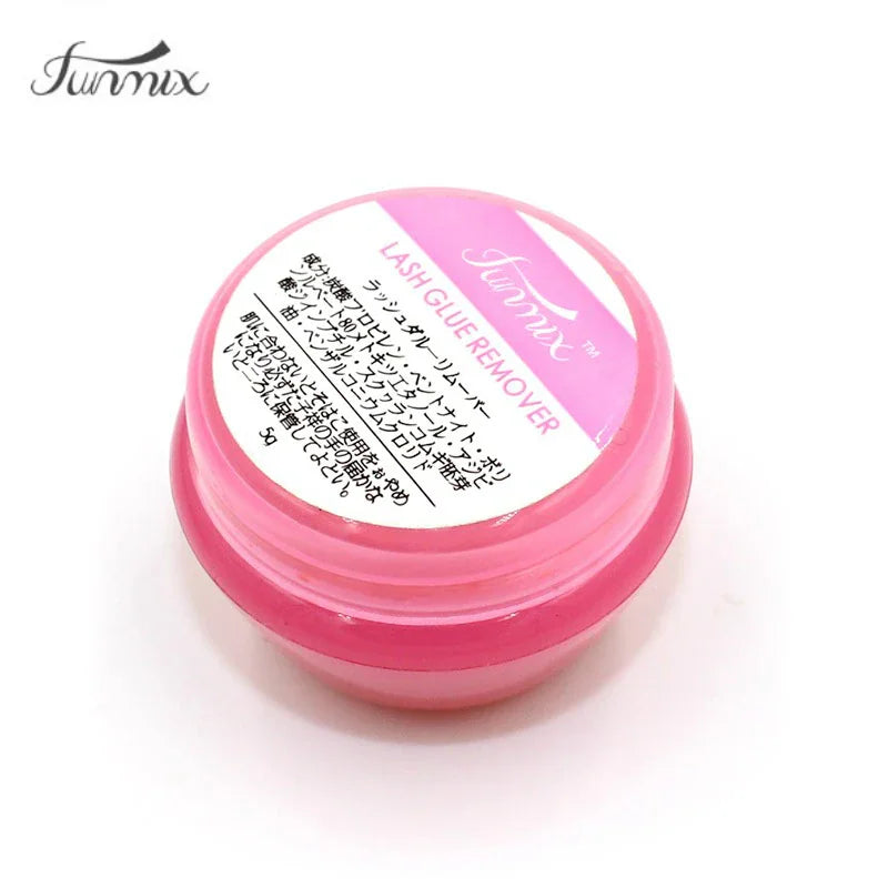 Pink pot of professional eyelash extension glue remover cream