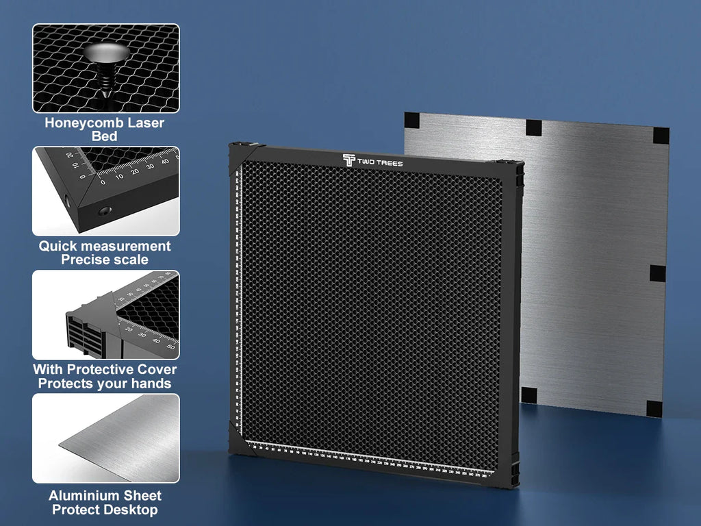 A black honeycomb laser bed with an aluminum protective plate and measurement scales.