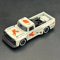 White diecast pickup truck toy model with red horse graphics and number 411