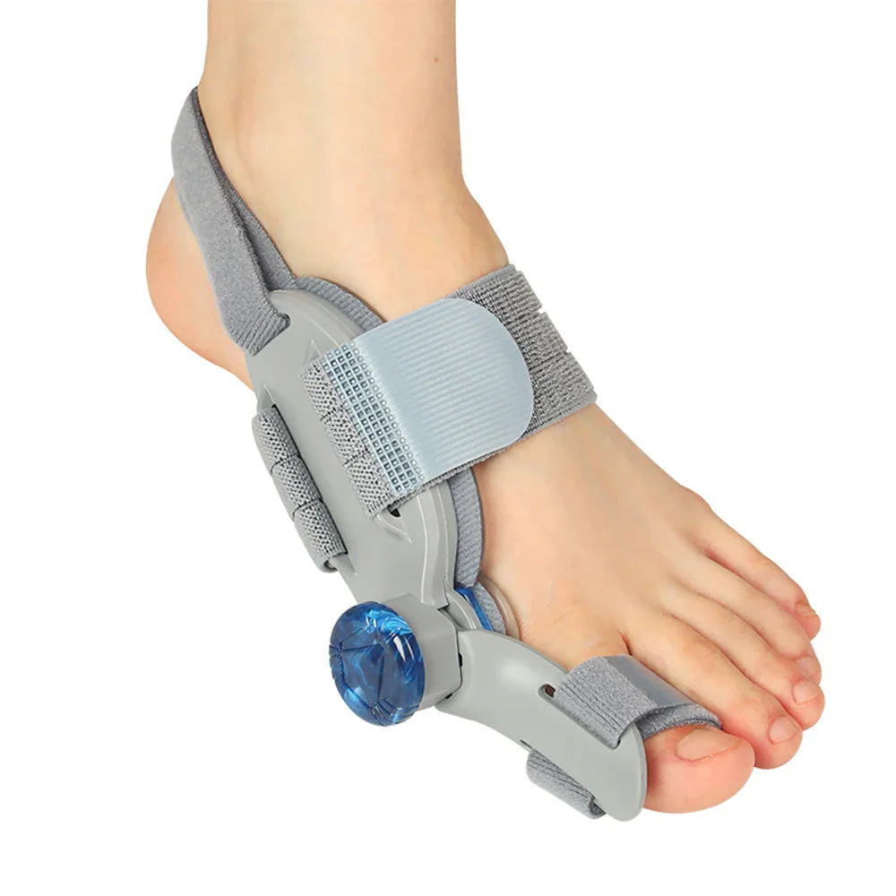 Adjustable bunion corrector brace with blue adjustment knob worn on a foot