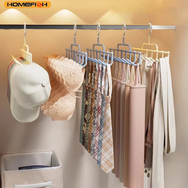 A rack of multi-hook hangers in a closet used to organize caps, bras, ties, and belts