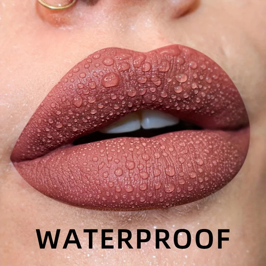 Close-up of nude matte liquid lipstick on lips with water droplets
