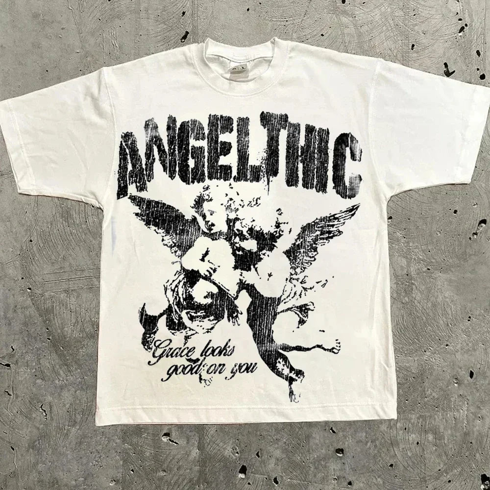 White oversized t-shirt with an angel graphic and 'Angeltic' text