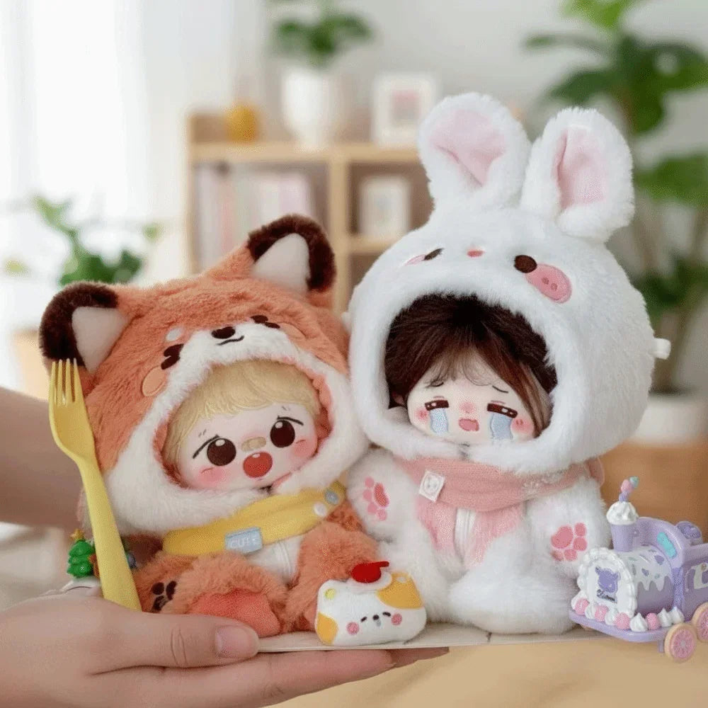 Two plush 20cm dolls wearing fox and rabbit animal jumpsuits held in hand