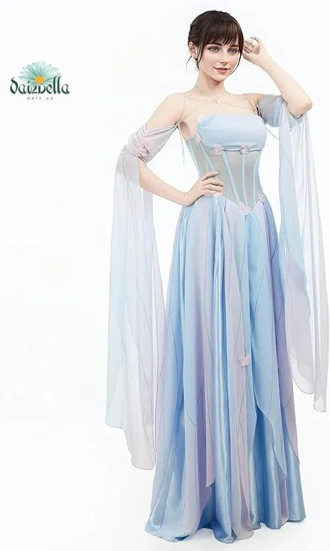 Woman standing and posing in a blue butterfly fairy style long dress