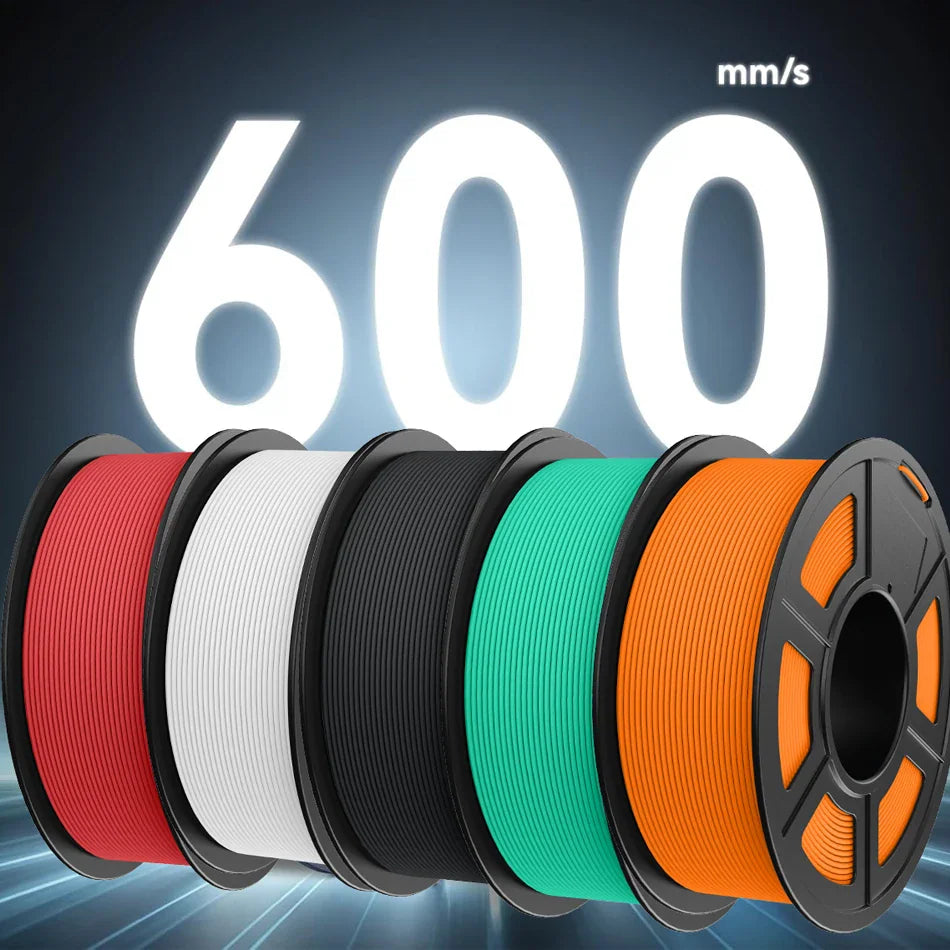Five spools of various colored matte PETG 3D printer filament aligned in a row