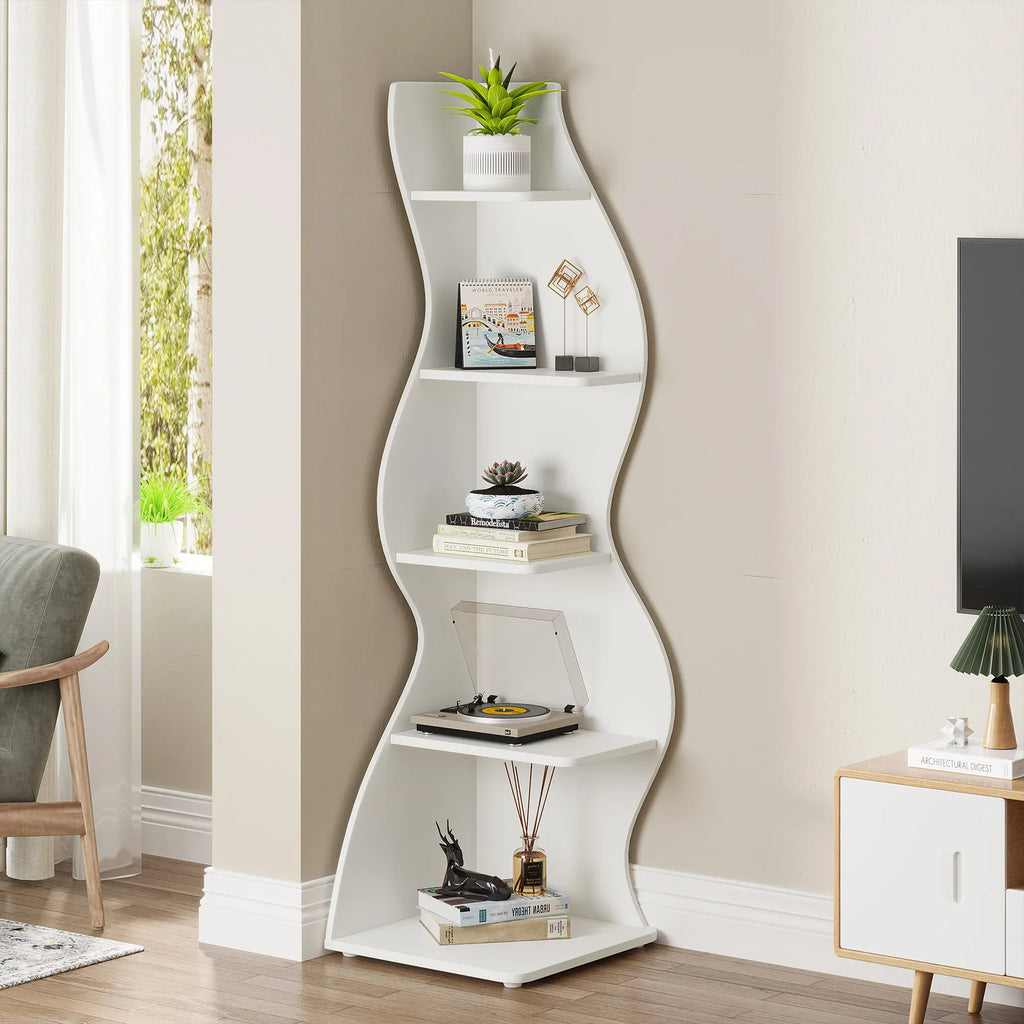 White 5-tier wavy corner shelf holding decor, books and a small plant, in a bright home interior