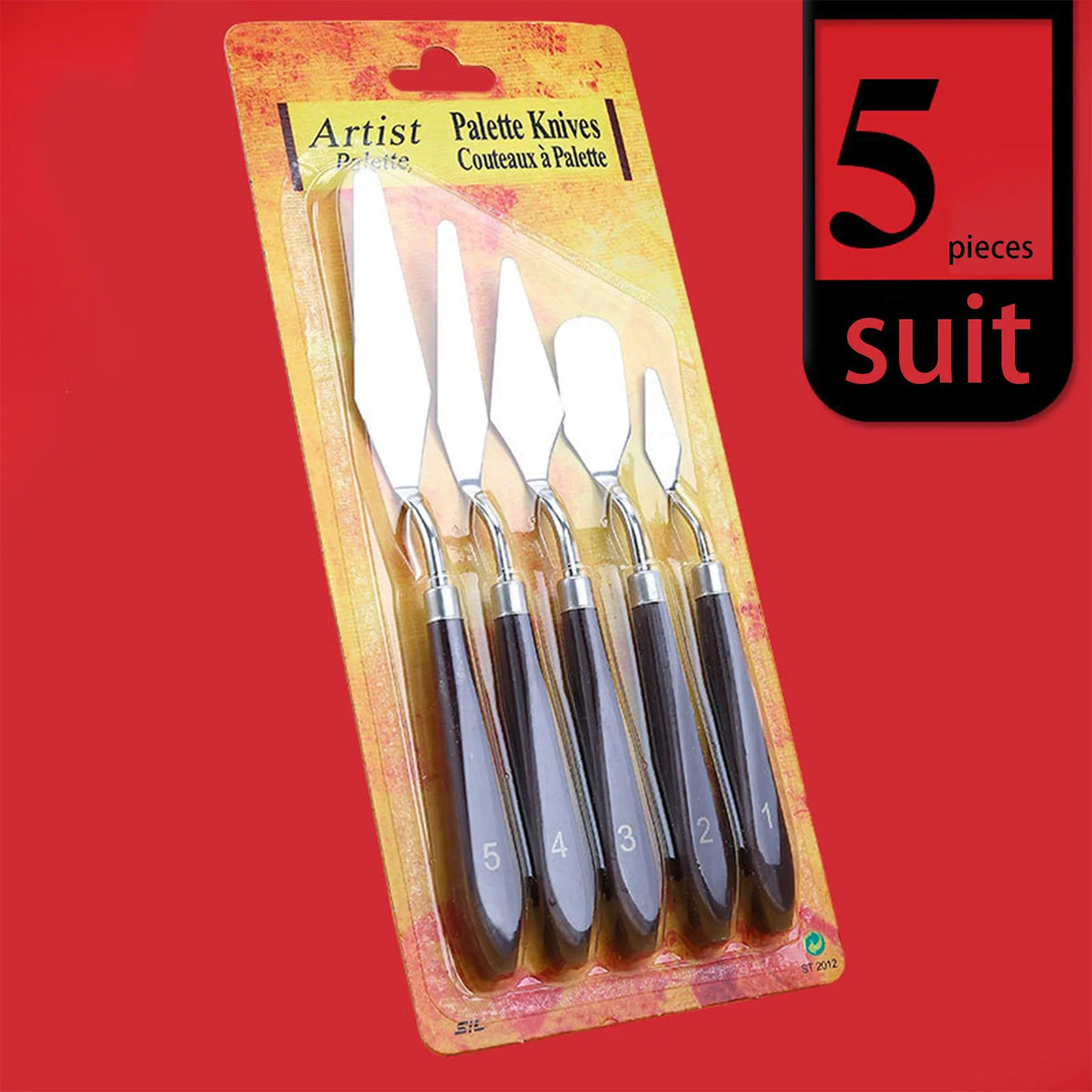 A set of five artist palette knives with brown wooden handles in retail packaging