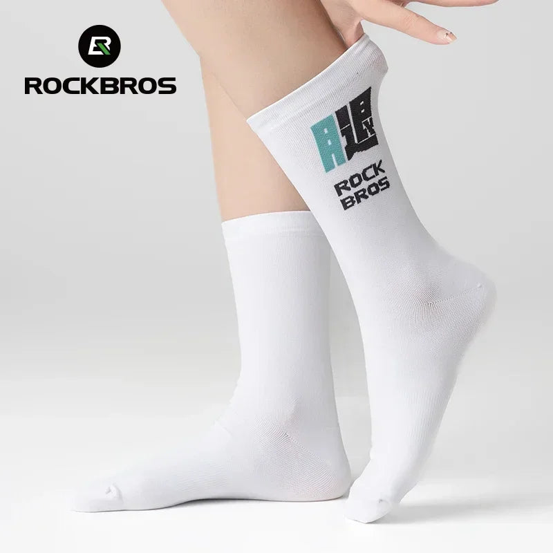 Person wearing white crew socks with a pixel art graphic on the calf