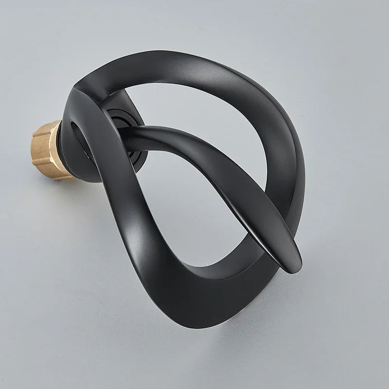 Matte black decorative abstract basin faucet