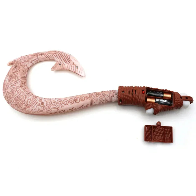 Cartoon adventure fish hook toy with the battery compartment open showing battery placement