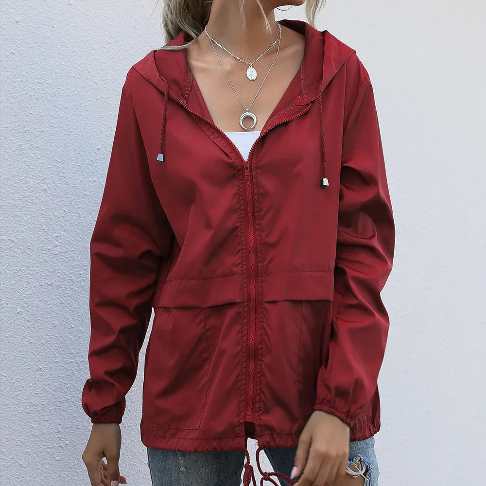 Maroon hooded zip-up windbreaker jacket