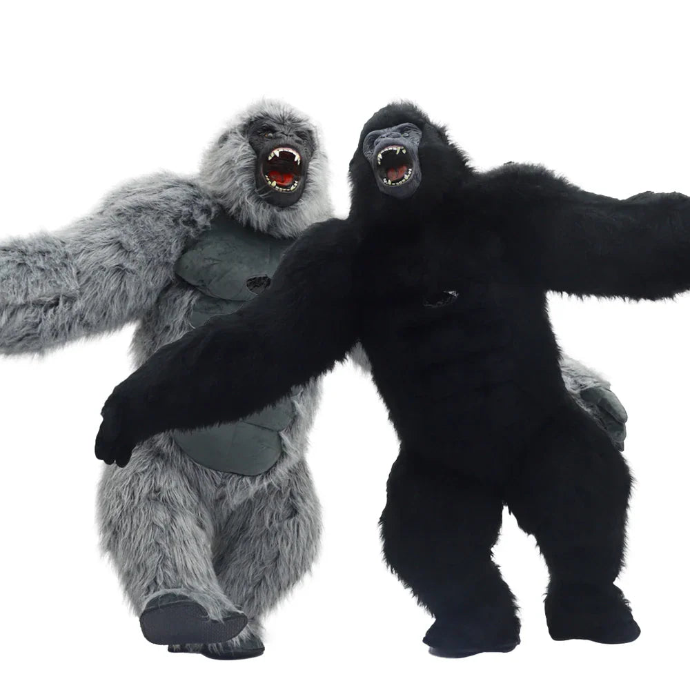 A black and a grey king kong mascot costumes standing on a white background.