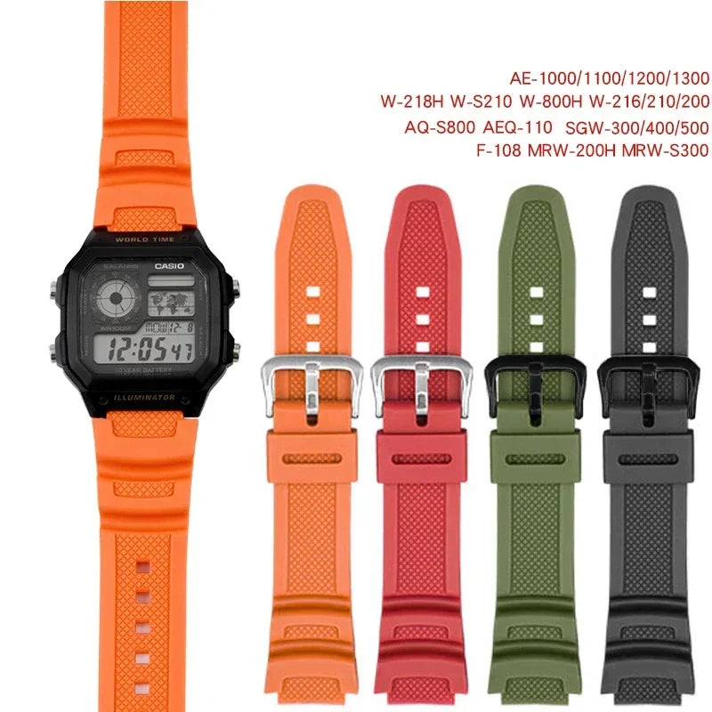 Orange, red, green and black rubber watch straps with a digital watch