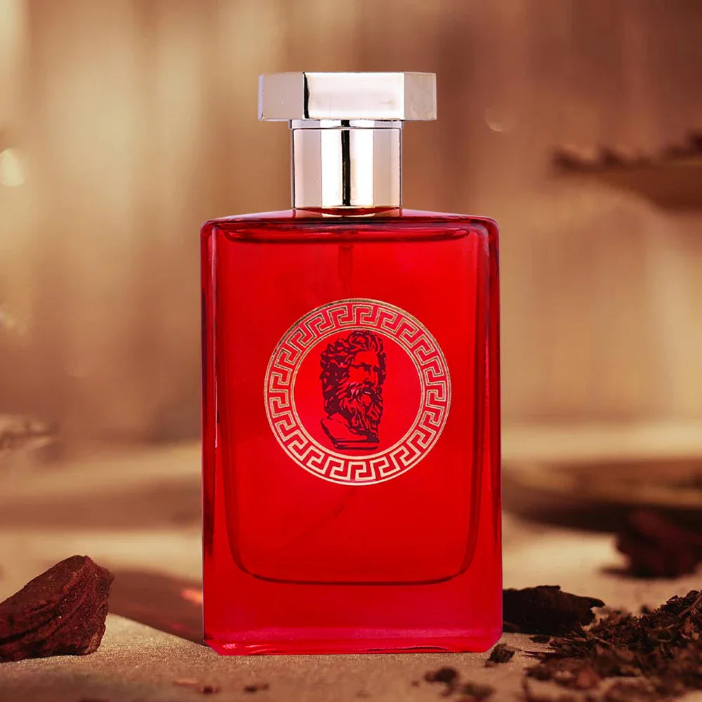 Red rectangular glass perfume bottle with gold cap