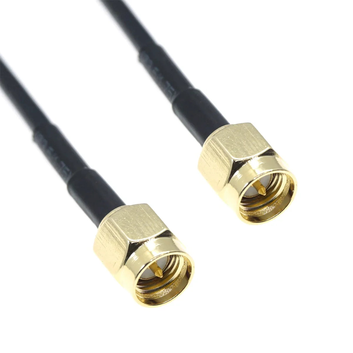 Close up of gold SMA connectors on black coaxial cable