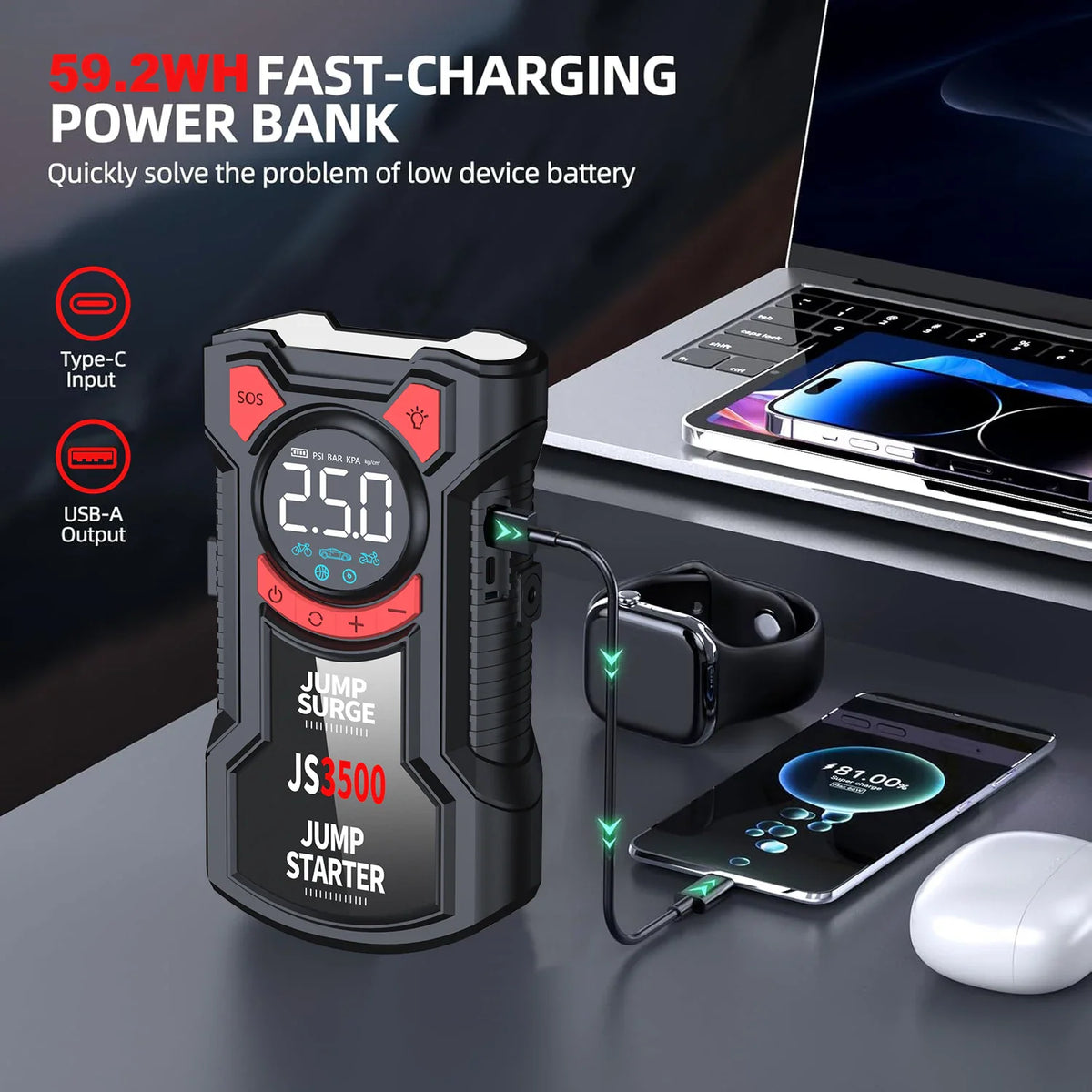 Portable jump starter power bank charging a smartphone and smartwatch