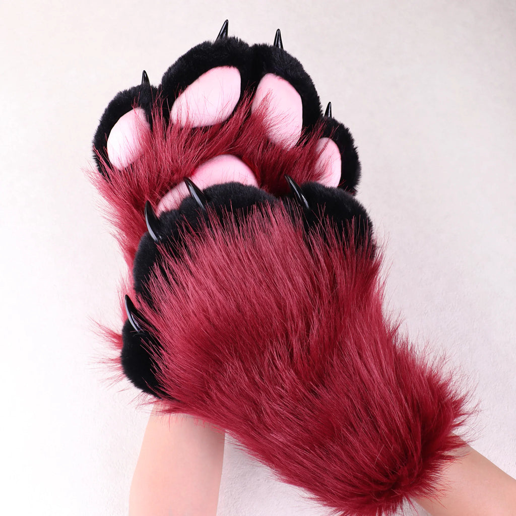 Dark red and black plush animal paw gloves with pink paw pads and sharp claws.