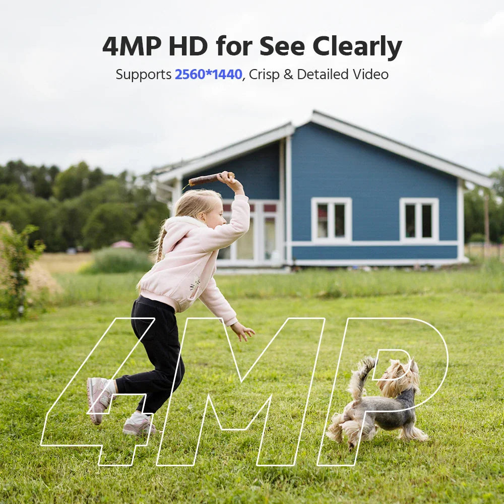 A child playing with a dog in a garden with a house in the background