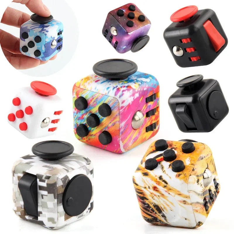 A variety of multi-colored sensory fidget cube toys with different surface features for stress relief