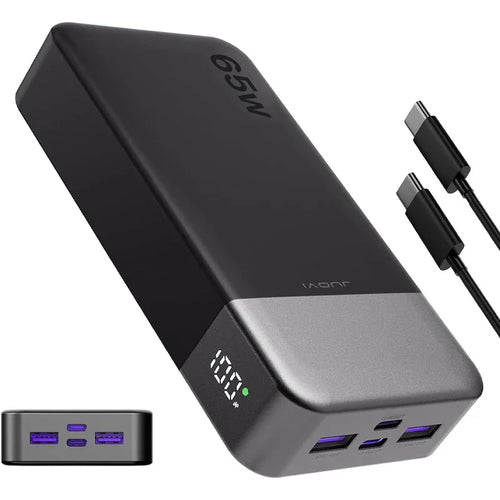 A black and grey 65W portable power bank with cables and view of charging ports.