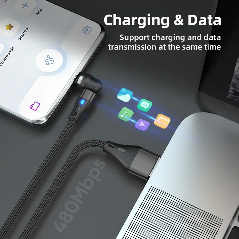Magnetic charging cable connecting a smartphone to a laptop for data transfer
