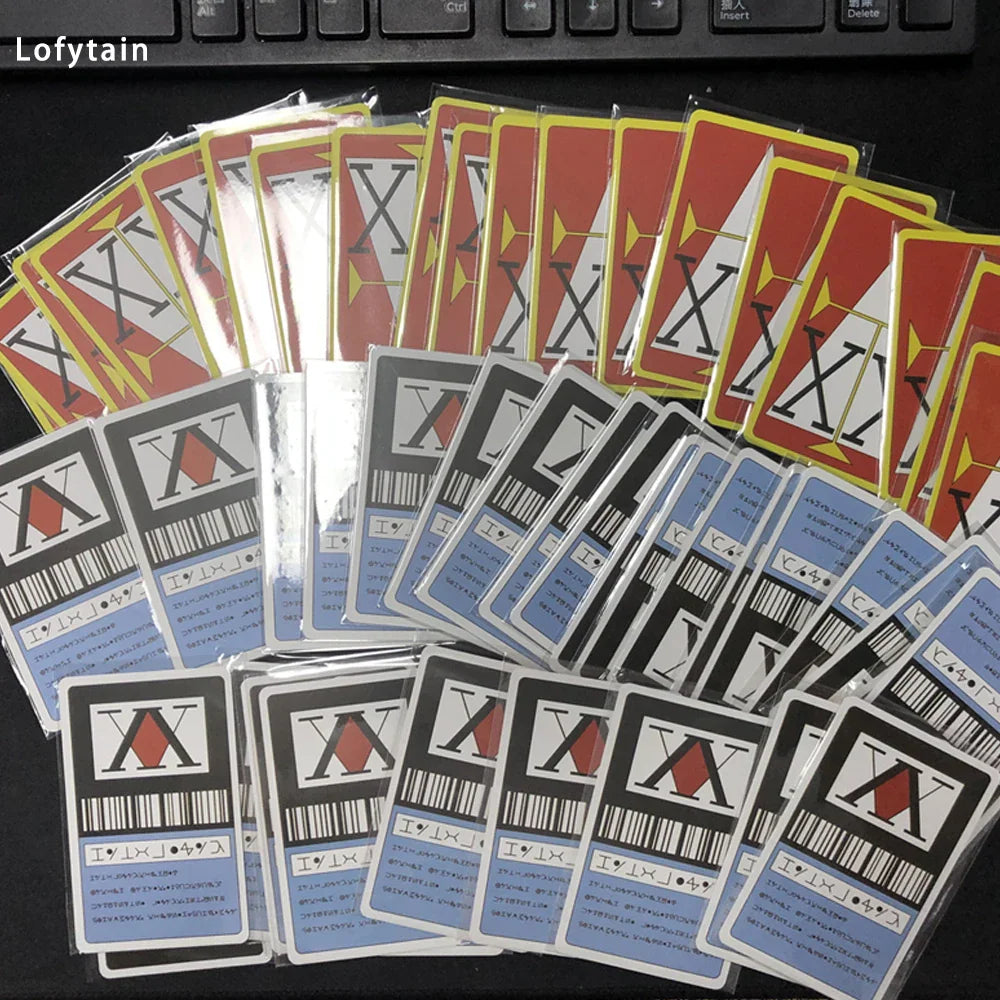 Large collection of stacked plastic anime-themed license cards with red and blue accents