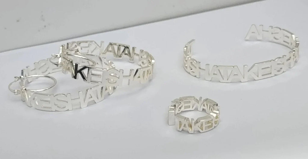Custom silver-tone stainless steel name hoop earrings, cuff bracelet, and ring set