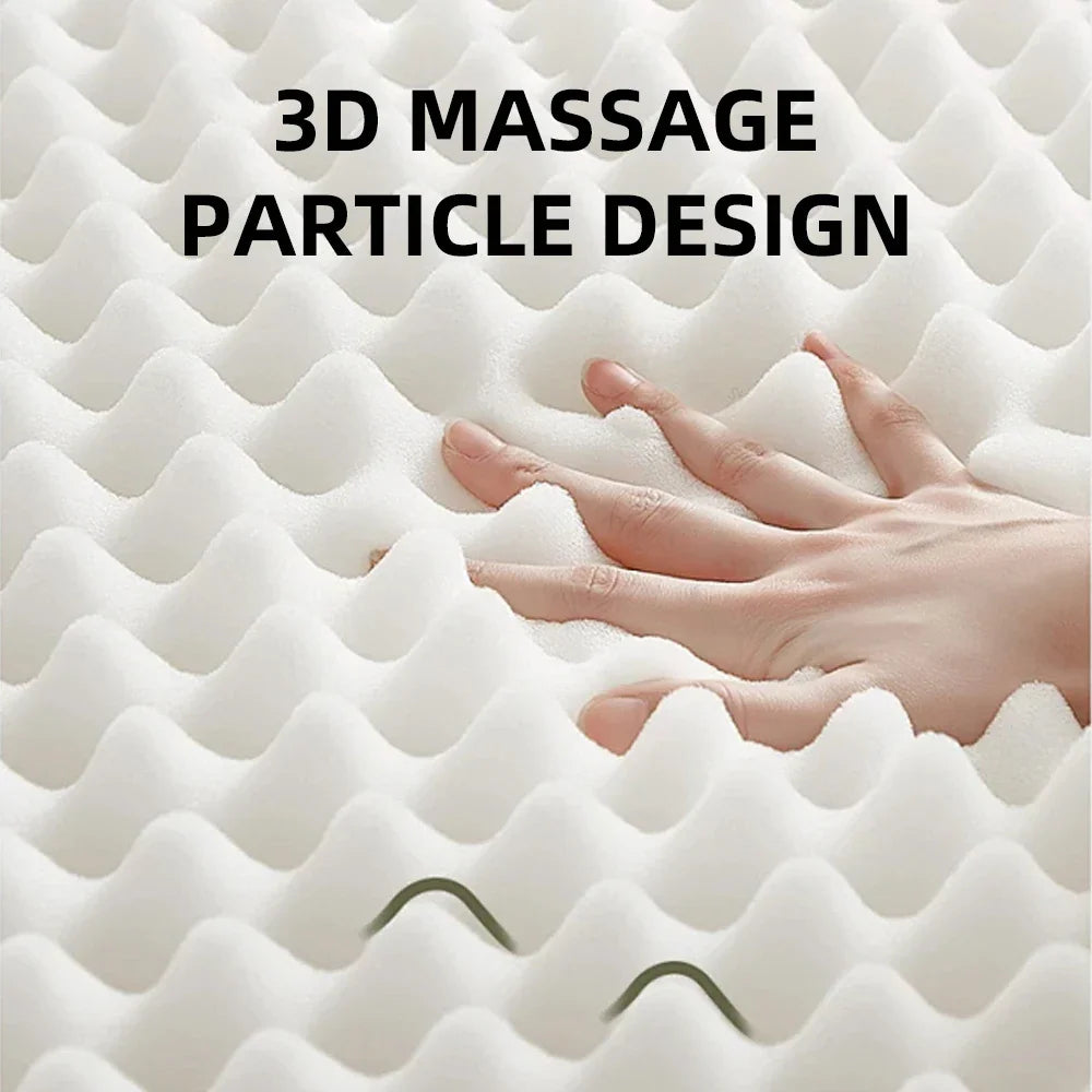 Close up view of the white 3D textured memory foam massage surface of the cushion