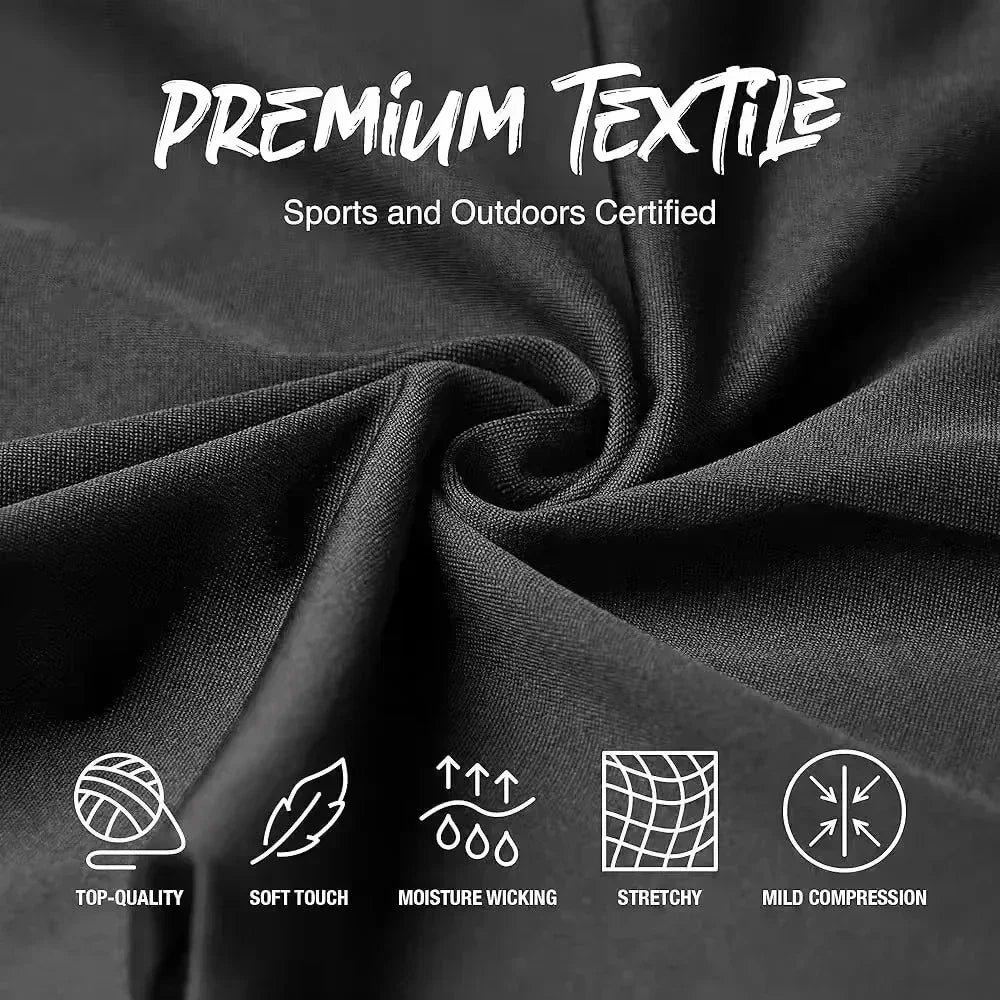Close up view of black fabric with labels describing fabric properties like stretch and moisture wicking.
