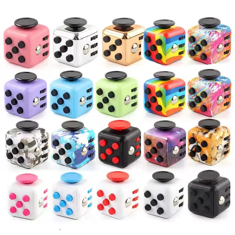 A collection of colorful fidget cubes with various patterns and solid colours.