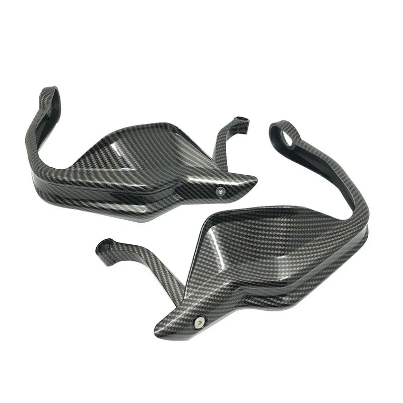A pair of motorcycle handguard wind deflectors shown in various color options for BMW adventure motorcycles. – Carbon Handguard
